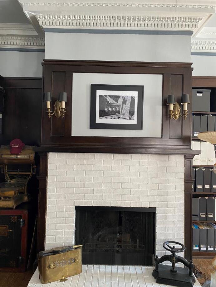 Library fireplace and built-in cabinets