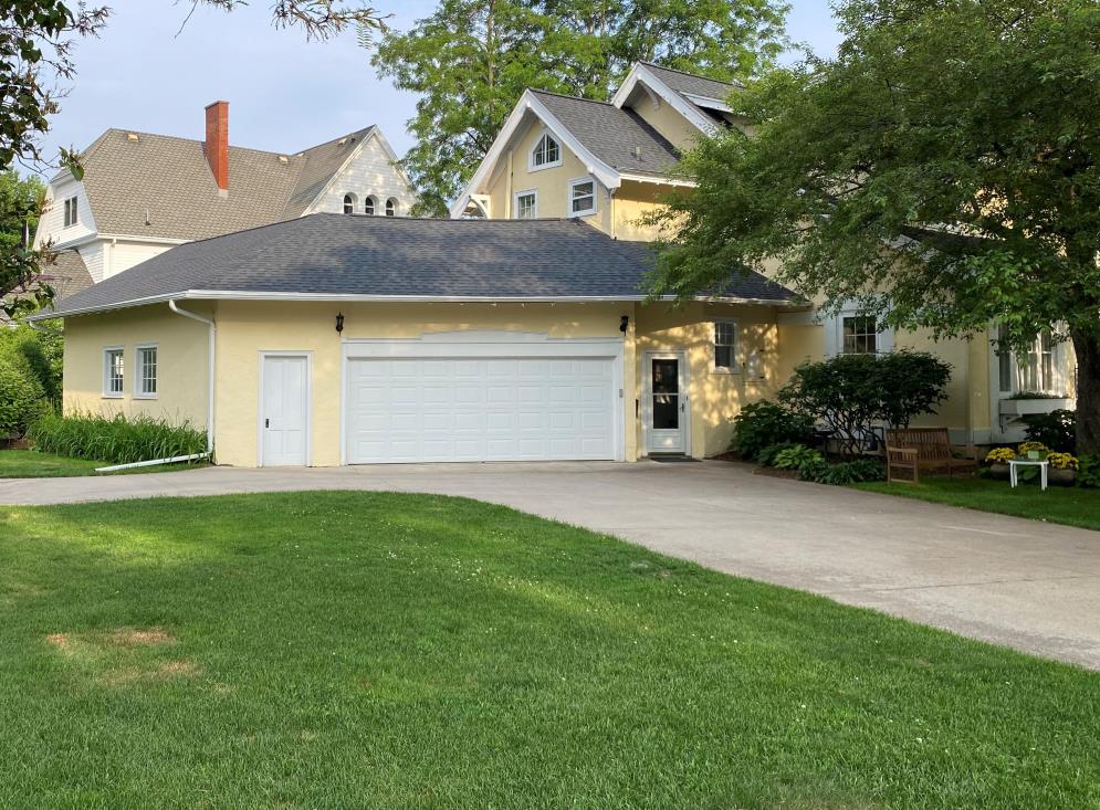 Original glazed and hinged doors on the 9th Street side